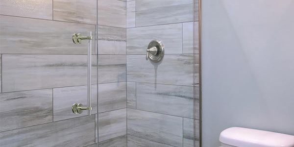 Brass and acrylic shower door pull