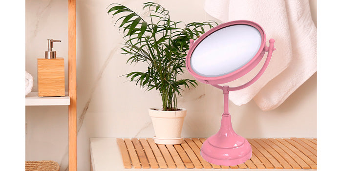 Brass makeup mirror with pink finish