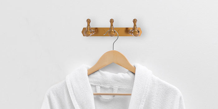 Bathrobe hanging of the middle hook of a 3-piece decorative hardware hook set